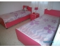 2 lits rose avec table de nuit