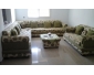 Salon fleurie vert et beige
